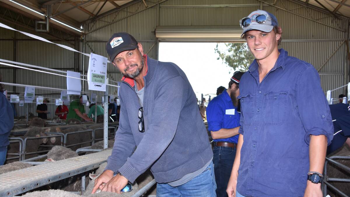 Inspecting the line-up of rams before the sale was return buyer Justin Matthews (left), with his son Noah. In the sale Mr Matthews purchased nine Quailerup West Poll rams at an average of $1500 and to a top of $2200.