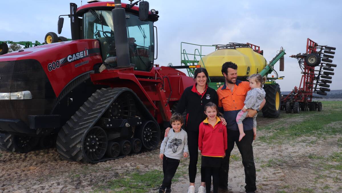  The Bone family in front of this years seeding rig: Liam (left), Deborah, Hannah, Ashley and recently turned two years old Zoe.