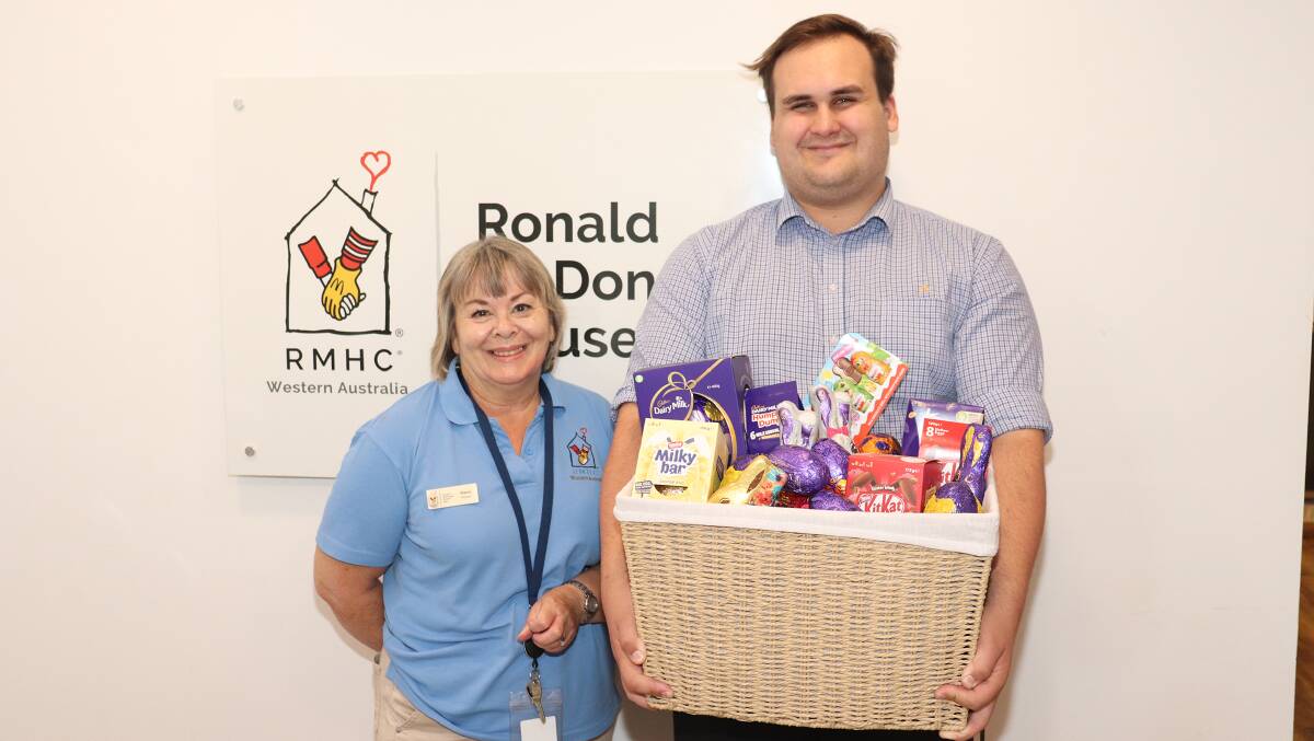 Ronald McDonald House volunteer Maria Riley receiving a donation from McDonalds Girrawheen, represented by Eli Caiacob. These donations and Western Australians generosity keep the house running.