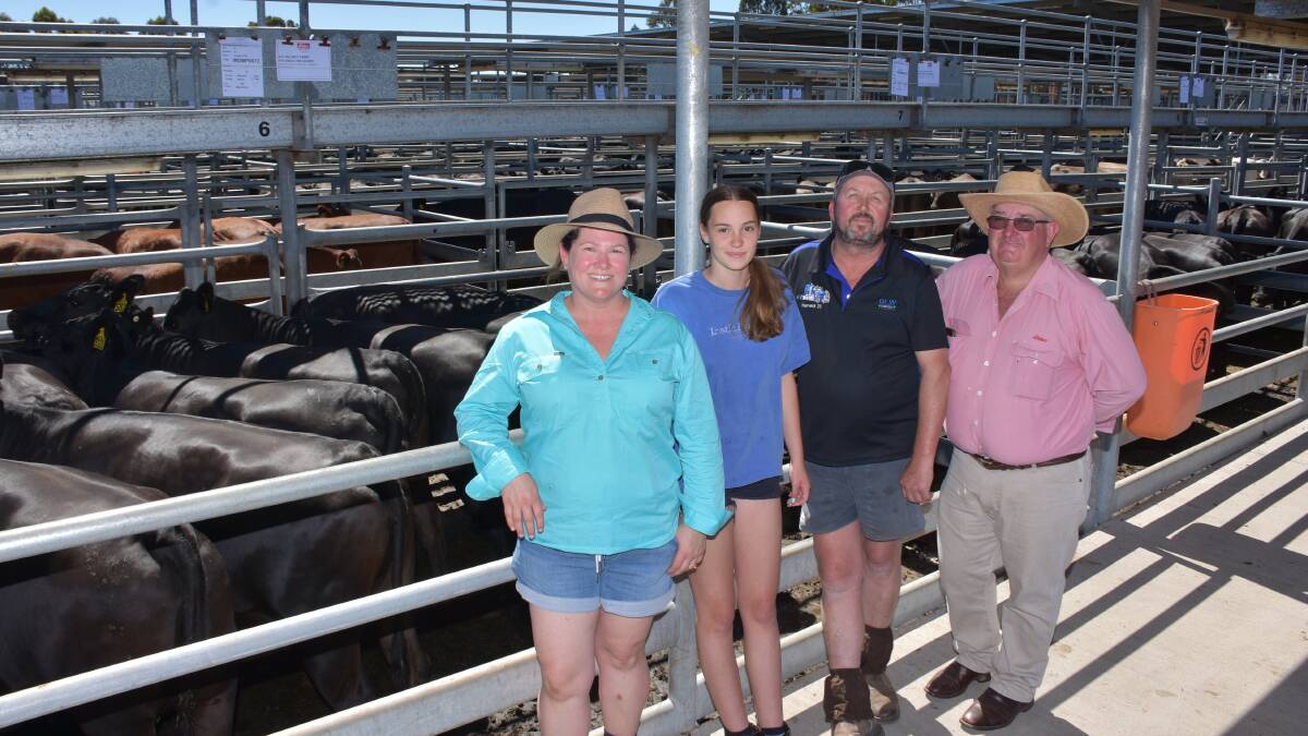 With the $1950 top-priced line of females sold by Hillcrest Farms, Walpole, outside the charity offering at last week's Elders Ray Norman Memorial Breeders Sale at Mt Barker were buyers Sarah (left) and Andy Frost, Narrikup, their niece Hannah Montini and Elders, Albany livestock manager and sale auctioneer Wayne Mitchell. The pen of nine second calvers were PTIC to an Angus bull.