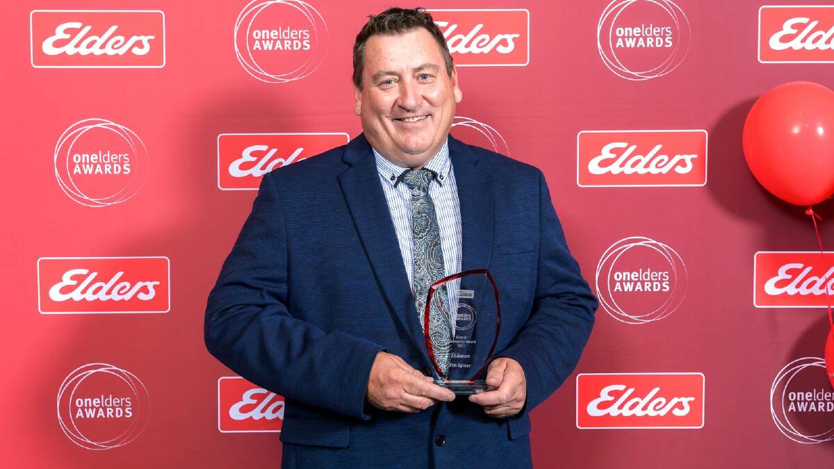 Elders stud stock sales manager WA, Tim Spicer with the Give It community award.