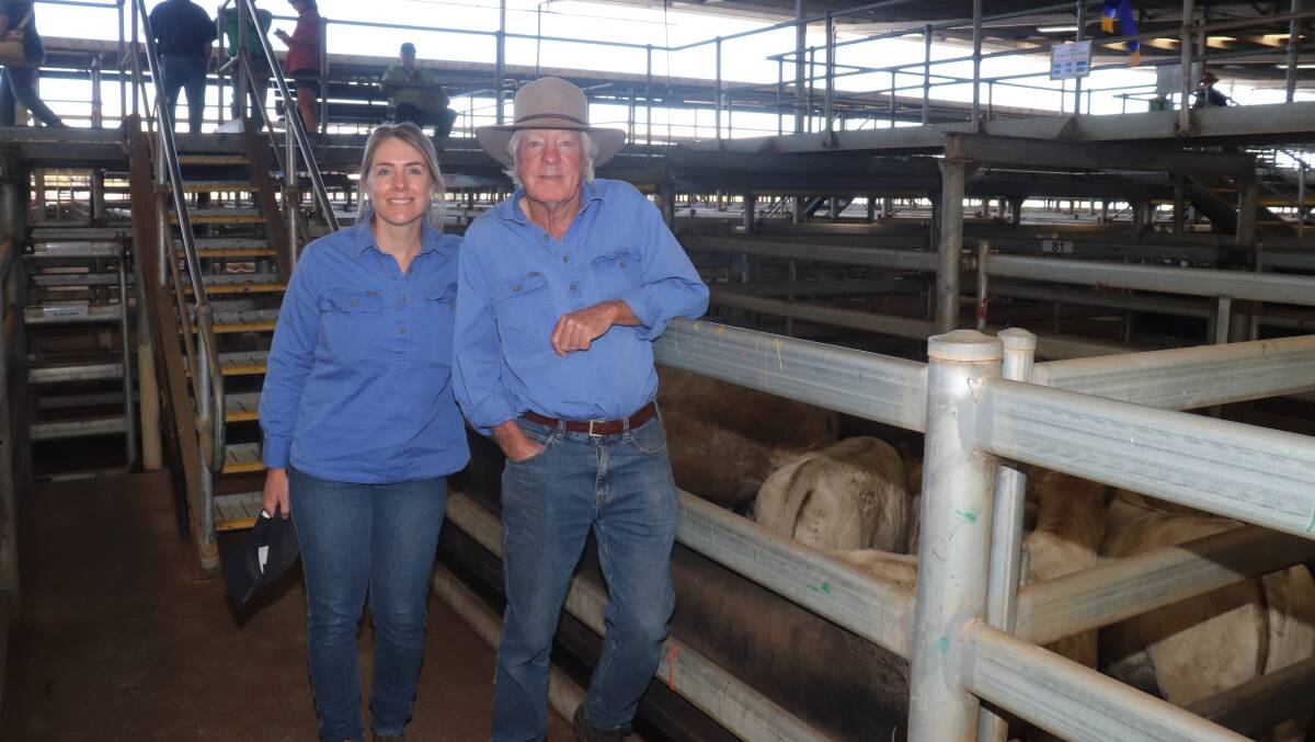 Sale vendors Bryden and Bruce Campbell, AS & M Campbell & Son, Keysbrook, with a pen of eight Charolais heifers they offered, that weighed 316kg and returned $727 and 230c/kg later in the sale.