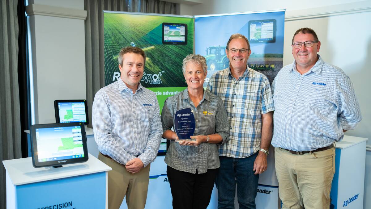 Ag Leader International business manager, Matt Wolfe (left), and Ag Leader Asia Pacific sales manager, Douglas Amos (right), congratulate Robyn and Roy Bailey from Kojonup Auto Electrics.