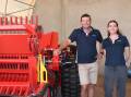 Waringa Distribution general manager, Sam Abbott (left) and marketing manager Reagan Gilmour with the NT78 Highline rock picker. 