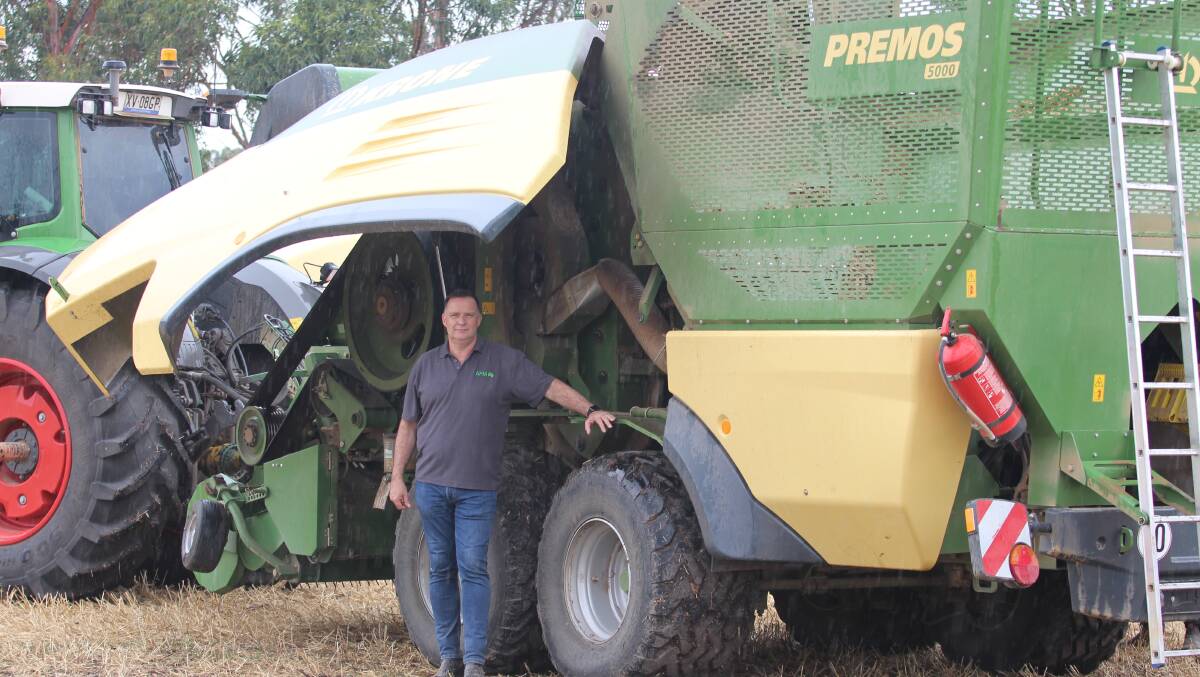 IN THE FIELD: Australian Fodder Industry Association CEO John McKew at a recent field day held in Victoria by Kubota Australia, showcasing the Krone Premos 5000 pelletiser. 