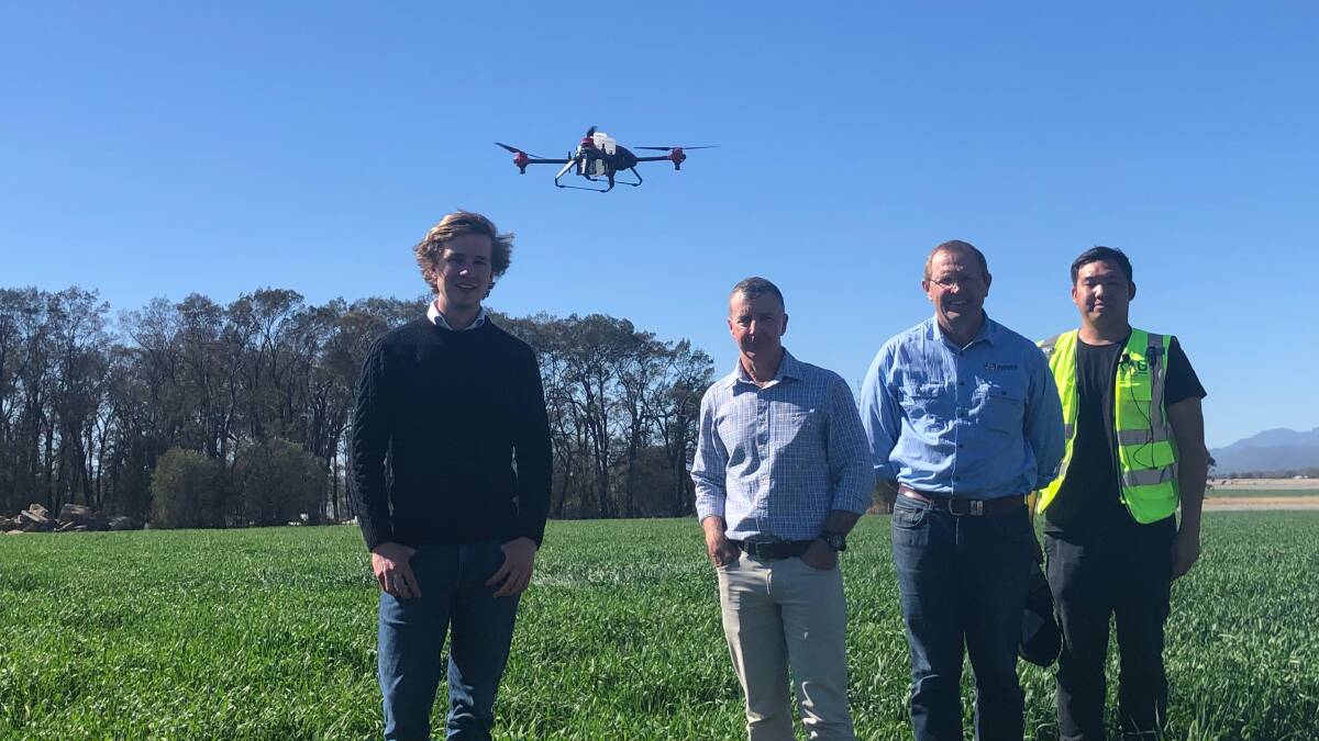 University of Sydney precision weed control scientist Guy Coleman, University of Sydney IA Watson Plant Breeding Institute director of weed research Michael Walsh, University of Sydney IA Watson PBI director for northern agriculture Guy Roth and XAg Charles Chow demonstrating the spray drone.