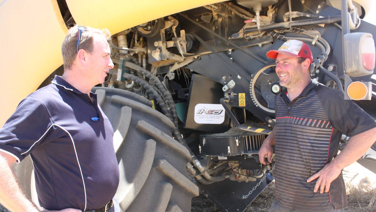 McIntosh & Son dealer principal Devon Gilmour with farmer Warrick Browne, Nyabing WA, who owns two iHSD units.