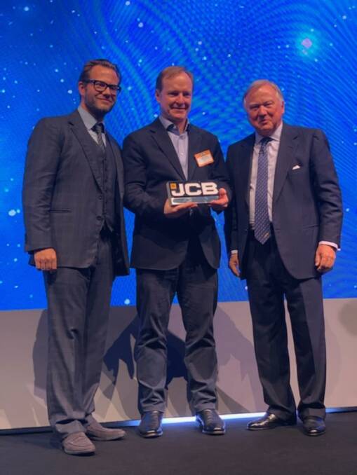 WINNERS: CEA CEO Hylton Taylor with JCB chairman Lord Bamford and JCB and managing director George Bamford.