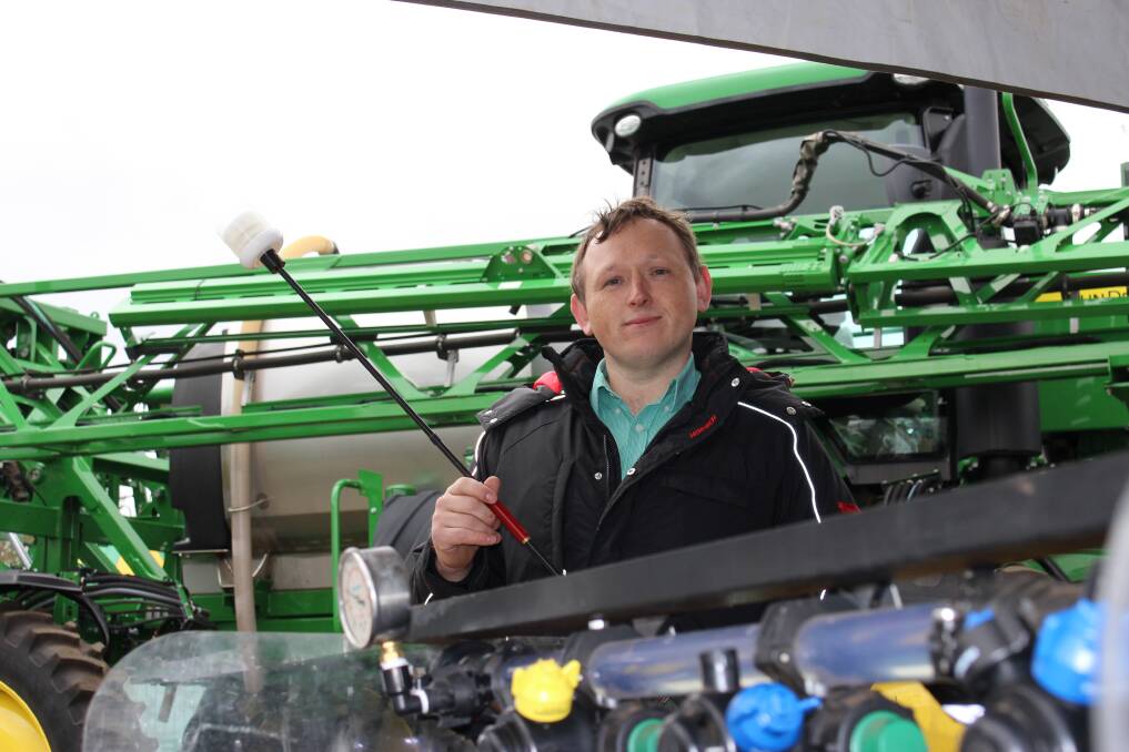 Vanderfield parts manager Andrew Winterbottom with the SpotOn inversion tester at CRT FarmFest.