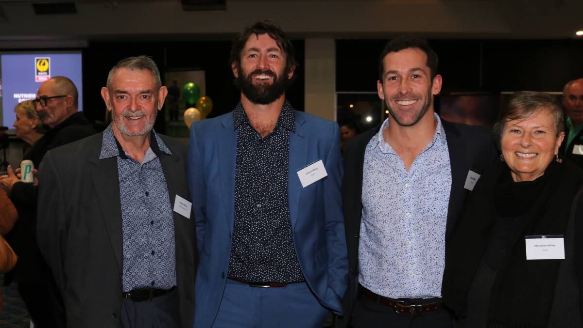 Newly inducted WACFL life member Milton Milloy (left), Morawa, with his sons Callum and Richard and wife Maryanne.