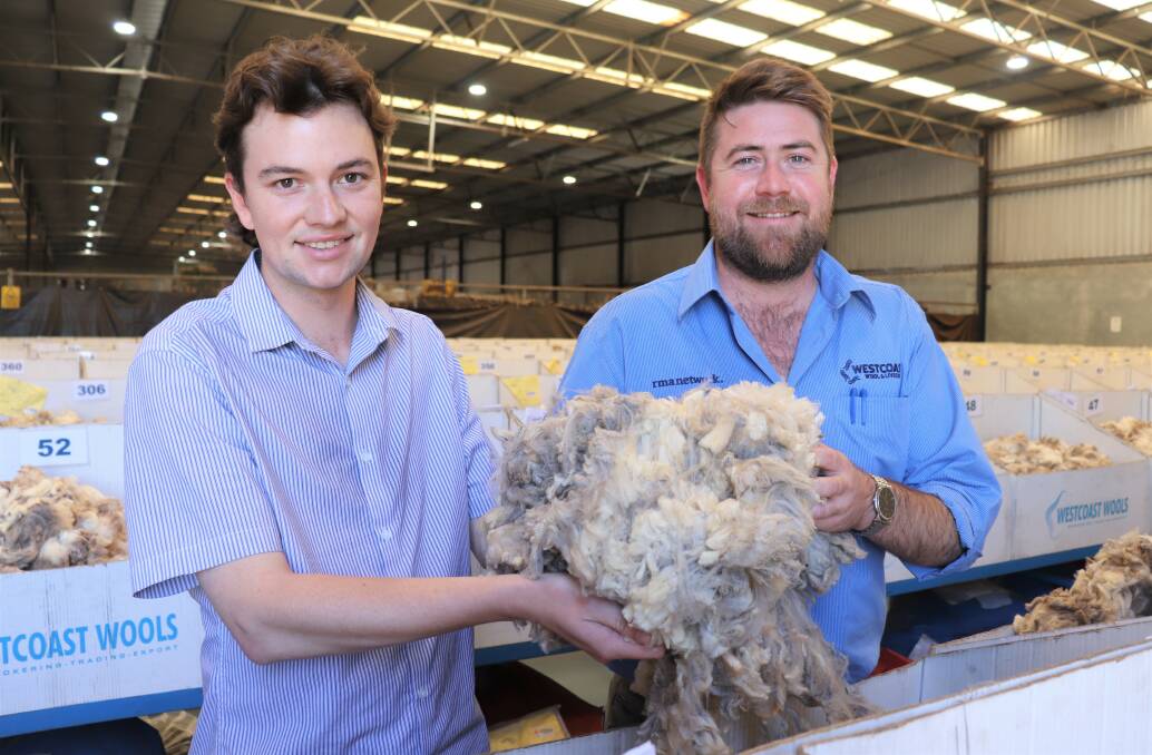 Max Foley (left), from Swan Wool Processors, which purchased donated wool for $2426.06 and Westcoast Wool & Livestock Responsible Wool Standard specialist Justin Haydock, who put the bale up for sale on behalf of woolgrower client Murray Hall, Tenterden. Proceeds from the sale went to the Michael Manion Wool Industry Foundation which helps rural families going through hard times.