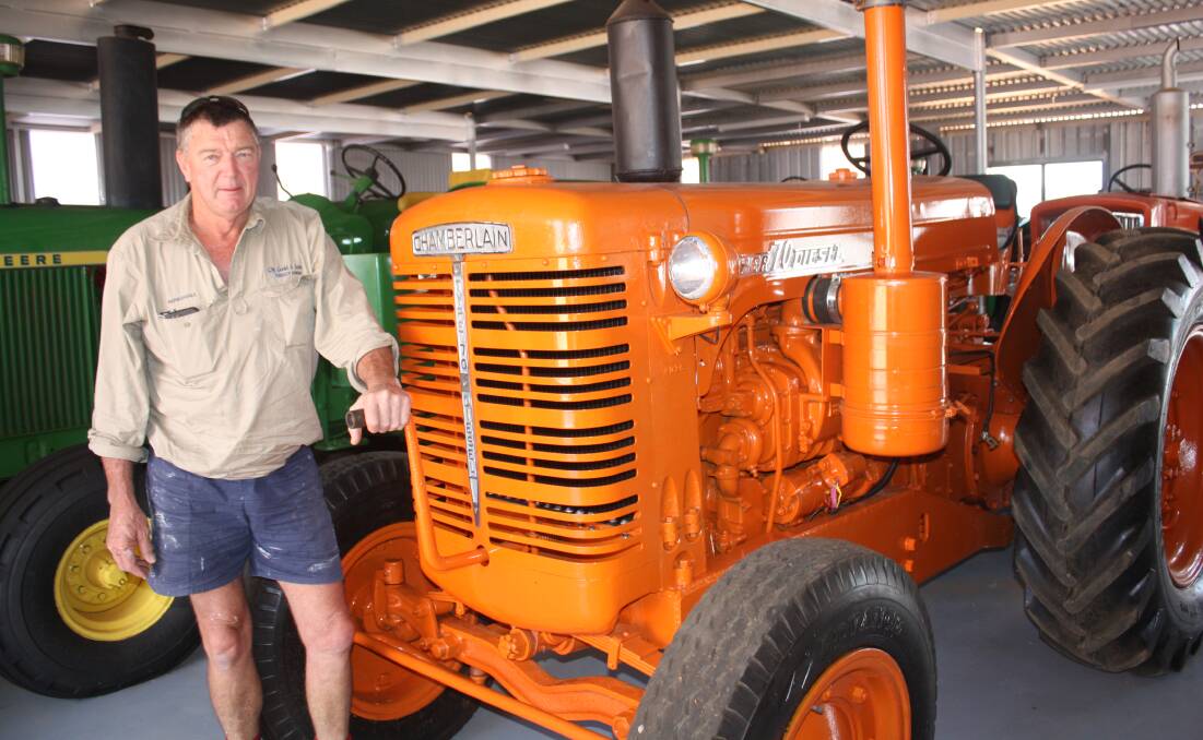 Chapman Valley farmer Marshall Gould next to a Chamberlain Super 70 Diesel model. With a rated drawbar horsepower of 39 kiloWatts (52 horsepower), developed from a Detroit Diesel 3.5 litre, three cylinder diesel motor, this model foreshadowed 'beefier' Chamberlains to come which dominated broadacre agriculture in the 1950s and sixties.