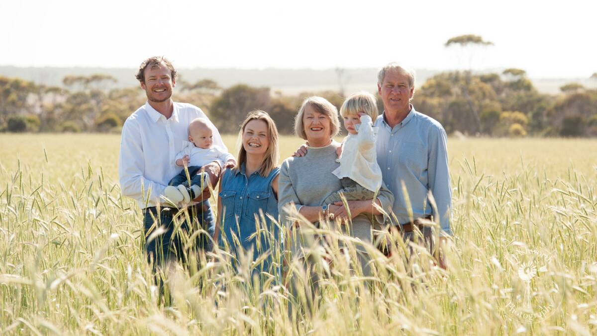 The Kelly family, Nick (left), Nathaniel (now 2-years-old), Lucy, Cathie holding Jude (now 4) and Malcolm gathered in the grain crop for this lovely portrait. Since it was taken the family has welcomed a new addition  daughter Claudia is four-months-old. Photo by Jo Ashworth Photography.