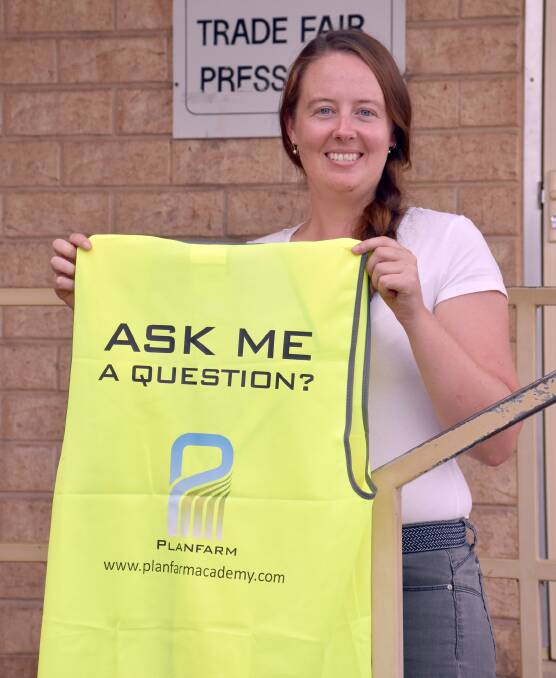  Make Smoking History Wagin Woolorama secretary Amy Kippin shows off one of Planfarm Academy's Ask Me A Question vests.