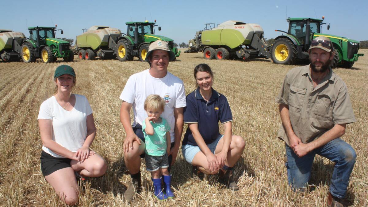Ready for another day of baling with three CLAAS 5300 Quadrant large square balers last week, were Katie Anderson (left), partner Reuben Woods, holding their son Fletcher, Elise Woods and Brent Leeson.