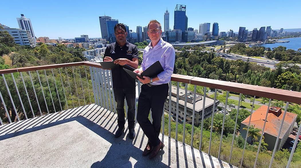 Wirrpanda Foundation founder David Wirrpanda (left) and Australian Potash Ltd managing director and chief executive officer Matt Shackleton sign a partnership agreement in Kings Park to create job opportunities for indigenous people in the Laverton region.