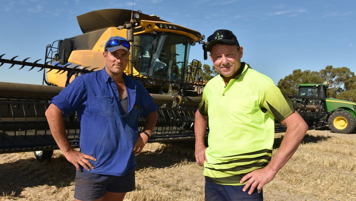 Jeff Edwards (left) and Ben Stockton said they were amazed with the yield results from their unique soil amelioration program after an almost record dry growing season.