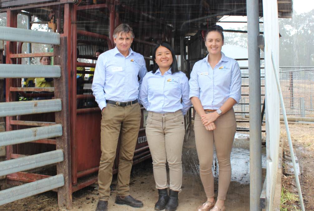  Scientist Ya-Chun Yu (centre) will lead Western Dairy's research, taking over from Dr Peter Hutton (left) at the end of the month. They are pictured with Western Dairy's extension officer and Young Dairy Network co-ordinator Jess Andony sheltering from the rain last Thursday at the WA College of Agriculture, Harvey.