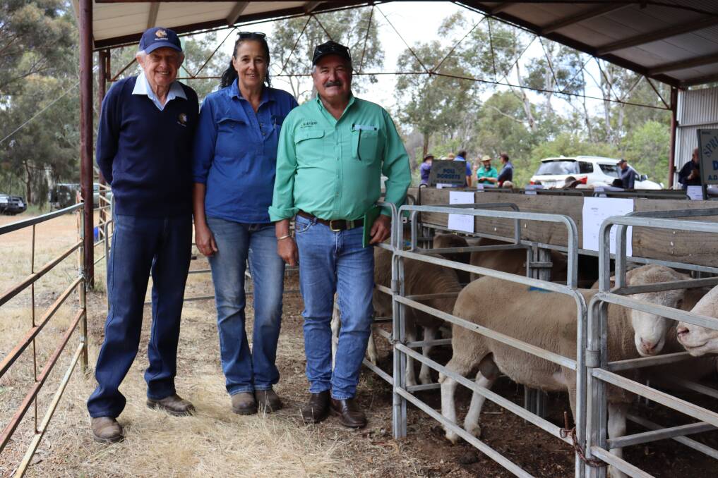 Denroy stud principal Roy Gooding with purchaser of the top-priced $1400 ram Robyn Quill, Darkan, and Nutrien Livestock auctioneer Peter Foley.