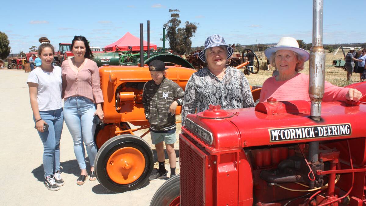  Enjoying the day were Wagin locals, from left, Giana Toseska and her mother Diana, Blaze Barrett, Cveta Mangalavite and Anne Riseborough. The orange tractor is an Allis Chalmers model.
