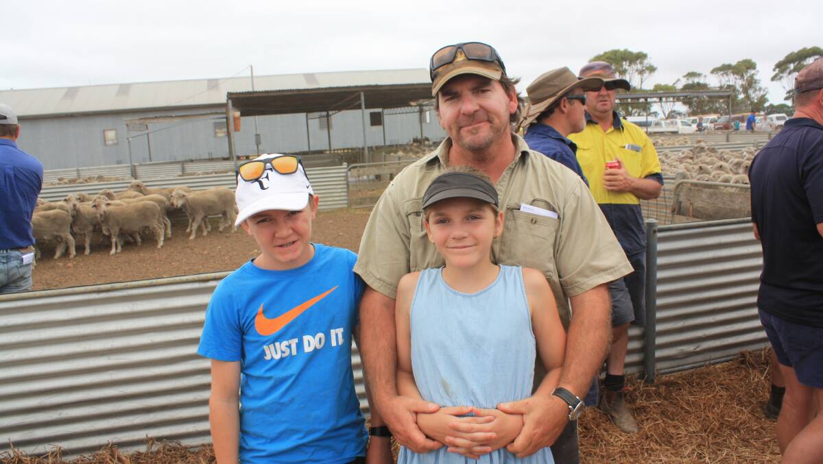 Munglinup farmer Peter Kirchner brought his children James and Amie to the sale as one of their last holiday outings before school resumed.