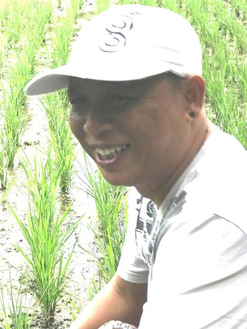 Former Bali rice grower Katut Putrayasa supports his ageing parents, who are still working in rice paddies, with income as a tour guide. 
