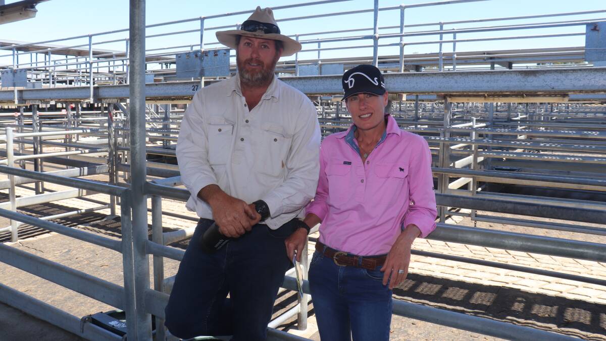 Volume buyers in the bull offering were Mark (left) and Bec Hardey, Empire Grazing, Bridgetown, who purchased four Shorthorn sires at an average of $5125.