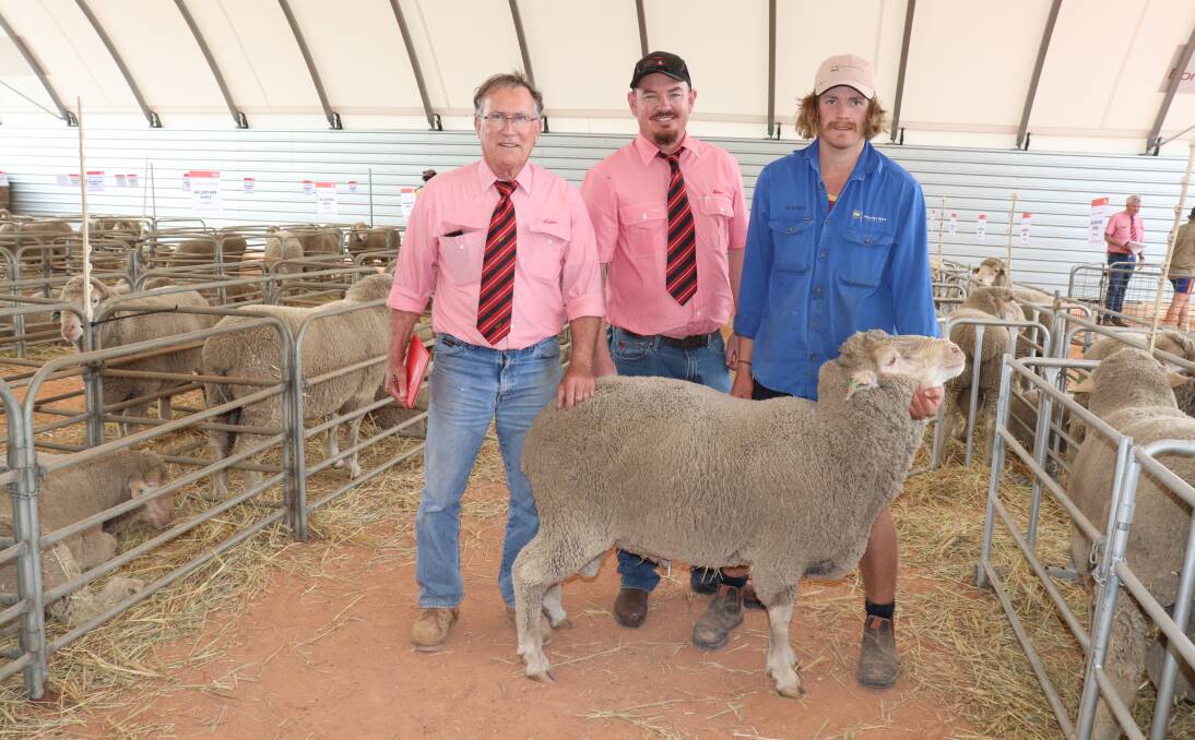  The $2500 top-priced Mollerin Rock Dohne ram sold to an undisclosed buyer. With it are Elders Koorda agent Wayne Maher (left), Aaron Goulden from Elders Wongan Hills and Mollerin Rock Dohnes co-principal Mitchell Applegate.