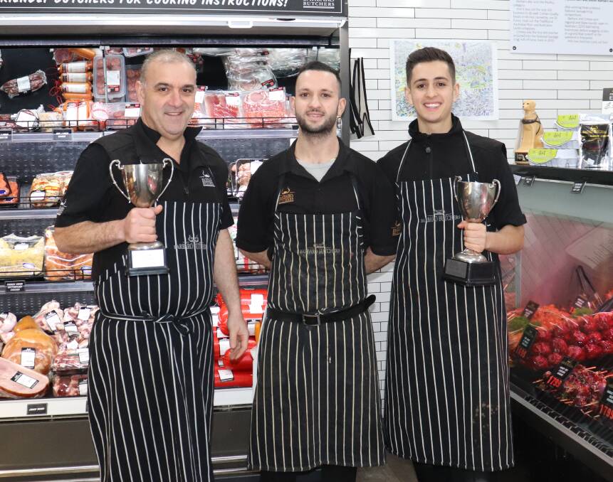 Raff Barbaro (left) and his sons, Stefan and Jayden, showing off the awards they have won.