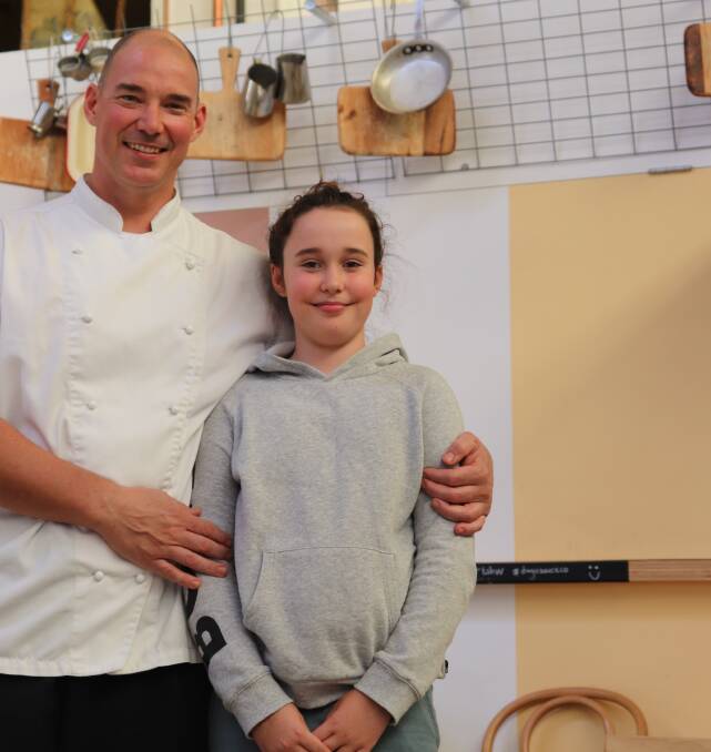 Mr Nash with daughter Lily, 11, at his Sunshine Harvester Works pop-up stall in Fremantle, Dingo Dining, which is currently open every Friday night.