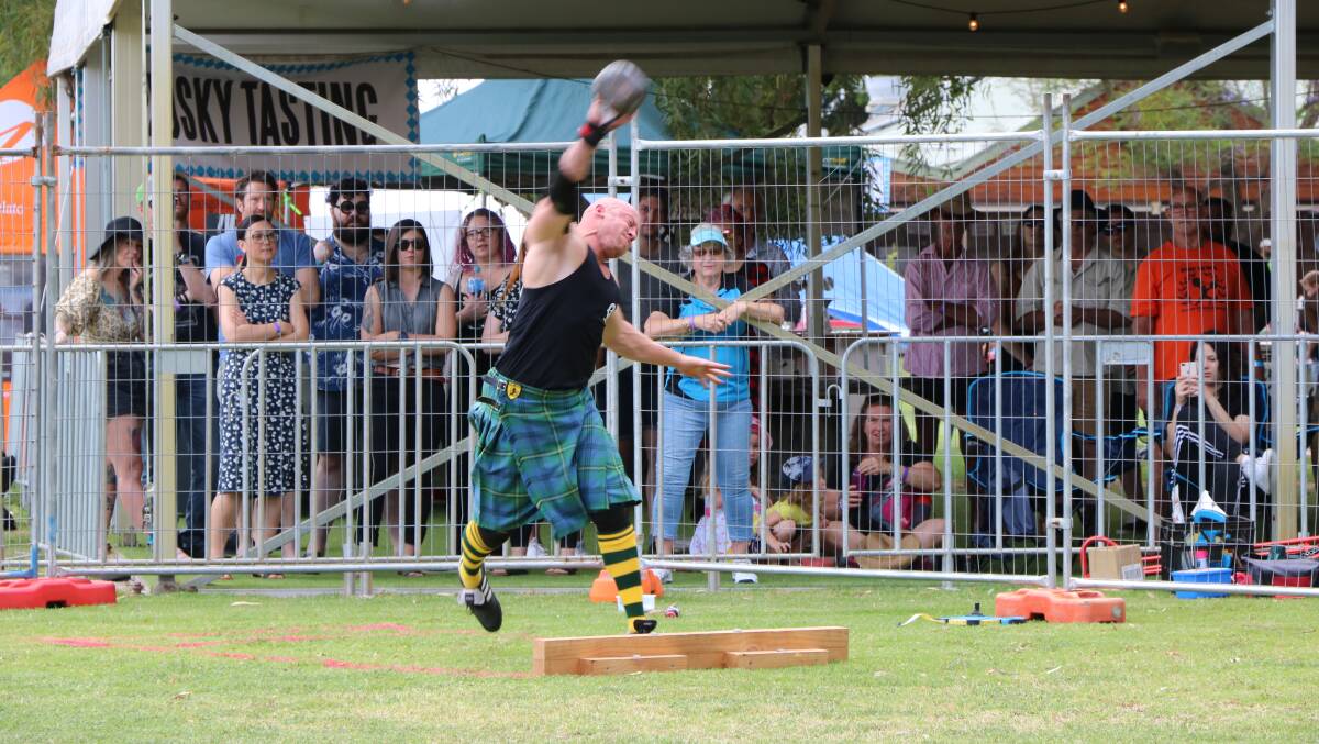 Highland Games deputy chairman Cameron Ford about to let loose during the weight throw at the recent Highland Games at Elmar's in the Valley.