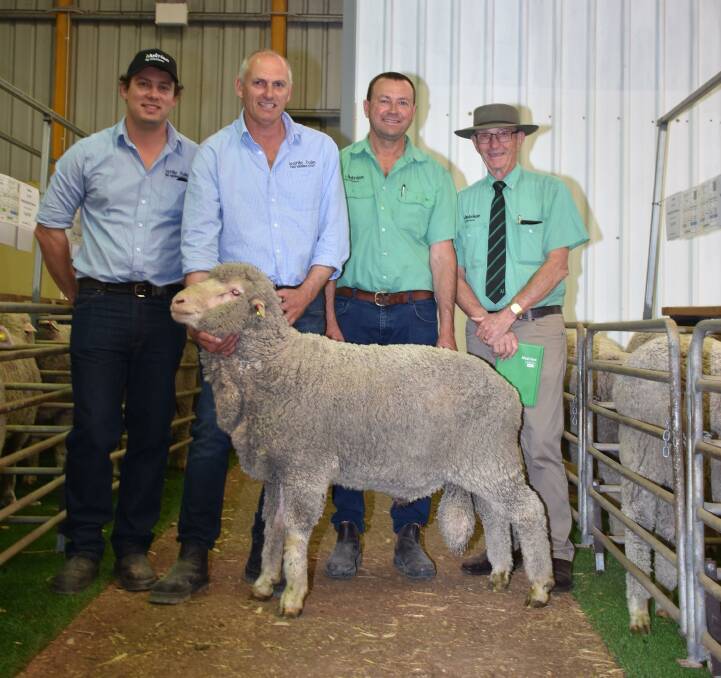 The Wattle Dale stud, Scaddan, achieved a top price of $3800 for this ram purchased by Dave and Lyn Mathwin, Barrule Grazing Co, Kojonup. With the ram were Wattle Dale co-principals Liam (left) and David Vandenberghe, Nutrien Livestock, Esperance agent Darren Chatley and Nutrien Livestock auctioneer Neil Brindley.