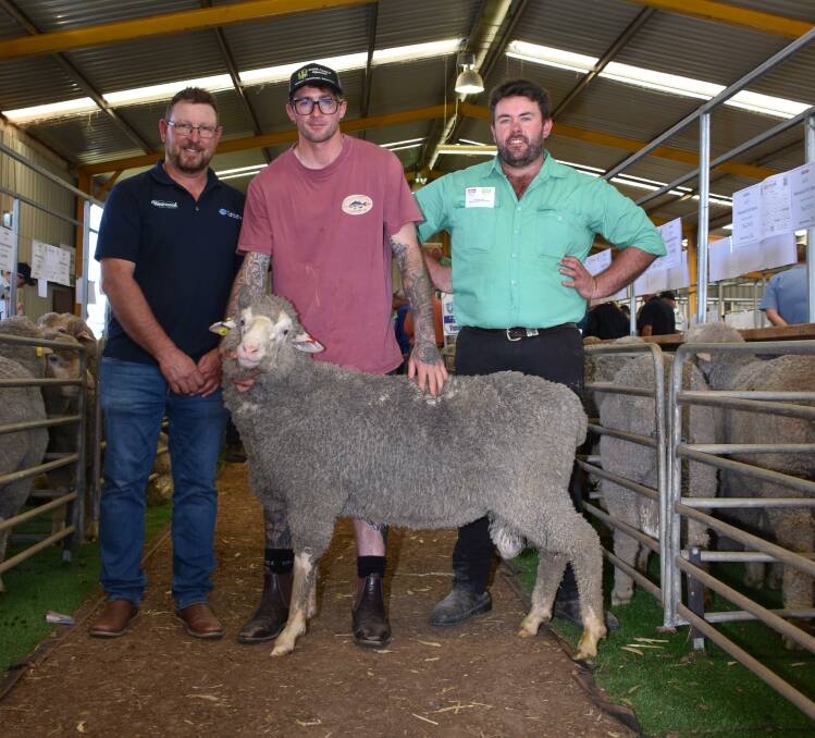 Prices hit a high of $5100 for this Poll Merino ram from the Westwood stud, Cascade, at last weeks Esperance Breeders Ram Sale. With the sale topping ram were Westwood stud principal Scott Welke (left), buyer BJ Whiting, Stonewolf Pastoral, Gibson and Nutrien Livestock, Esperance representative Jake Hann.