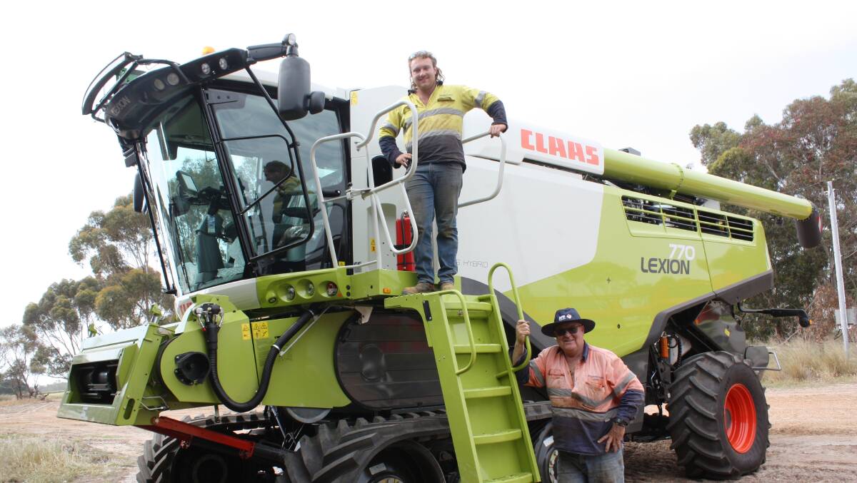 A happy duo before harvest ready to take their new CLAAS Lexion 770 into action – Neridup farmers JJ Wallace (left) and his father John.  