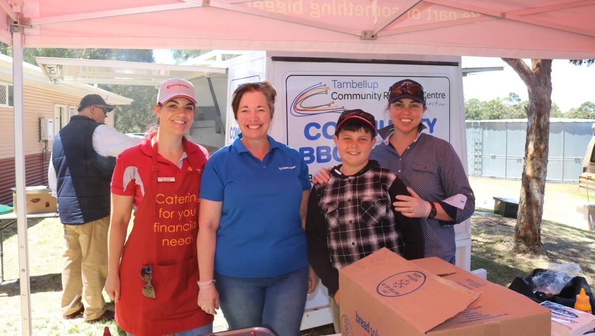 Cooking up a sausage sizzle storm with proceeds to Regional Men's Health were Natasha Thompson (left), Albany, Tracey Smith, Cranbrook, Nathan and Johanna Tomlinson, Bremer Bay.