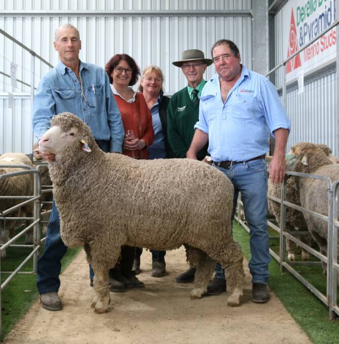 This sale-topping Poll Merino was bought for $6000 by Roger (left) and Joanne Nankivell, Condingup. With them were Derella Downs and Pyramid Poll stud co-principal Sue Pickering, Cascade, auctioneer Neil Brindley, Esperance and stud co-principal Scott Pickering.