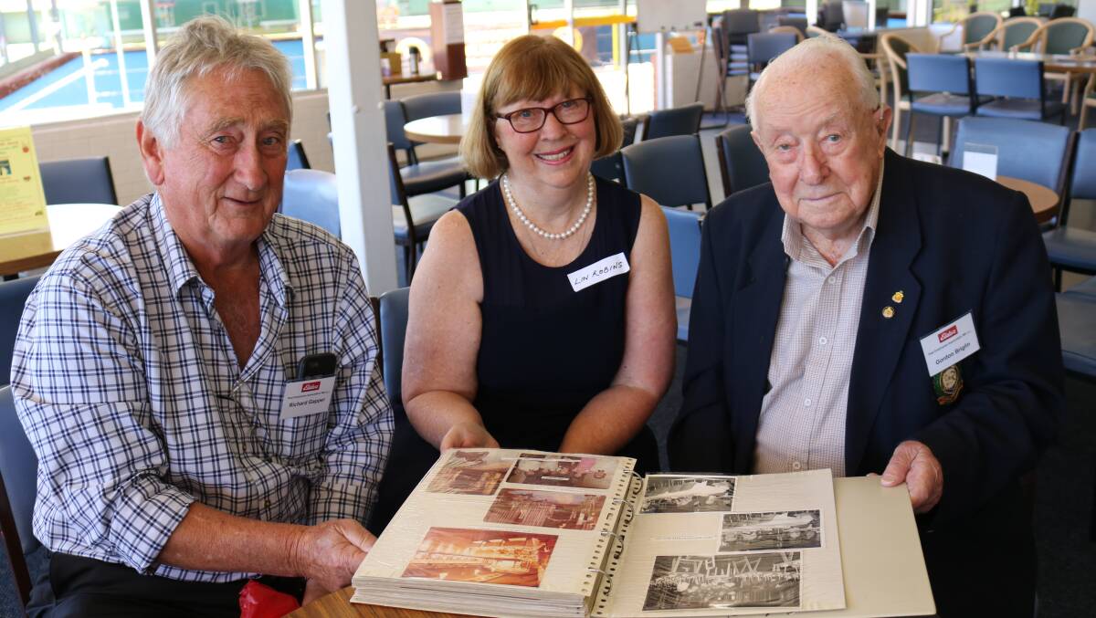 EPEA immediate past president and newsletter editor Richard Gapper (left), Attadale, looked through some old photos with Lin Robins, Gooseberry Hill and her father Gordon Briglin, Greenmount, who worked for Elders for 30 years and turned 100 in July this year.