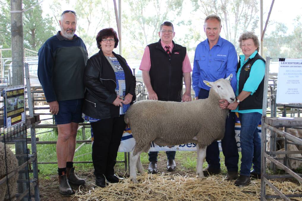 With the $1500 top-priced Border Leicester ram at last week's Dinninup ram sale were buyers Chris (left) and Robyn Patmore, Riverbend Border Leicester stud, Eneabba, Elders stud stock prime lamb specialist Michael O'Neill and Moss Hill Farms stud principals Rob Ivey and Wendy Cochrane.