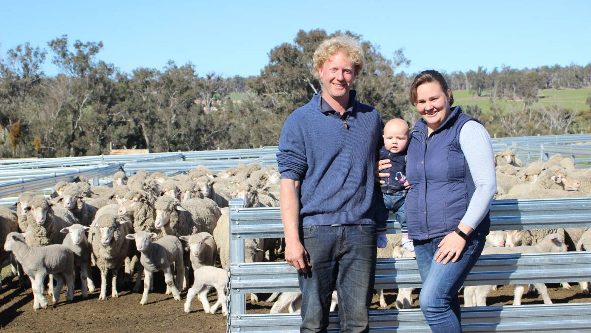 Seventh-generation farmer Wayde Robertson has spent his life surrounded by sheep, particularly Merinos. Pictured with him on their Boyup Brook property is wife Emma and five-month-old son Henry.
