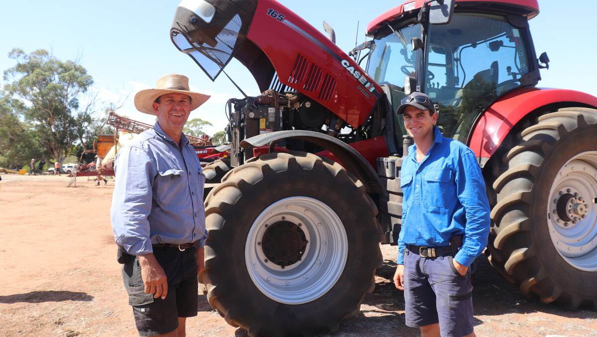 Darren Manning (left) and Ben Smart, both from Mardella, checking out the 2018 Case IH Puma 165 front-wheel-assist tractor that had 1060 engine hours showing, like the rest of the Case equipment offered had been serviced by Boekeman Machinery and came with AFS Pro 700 display. It sold for $165,000 as second top-priced item.