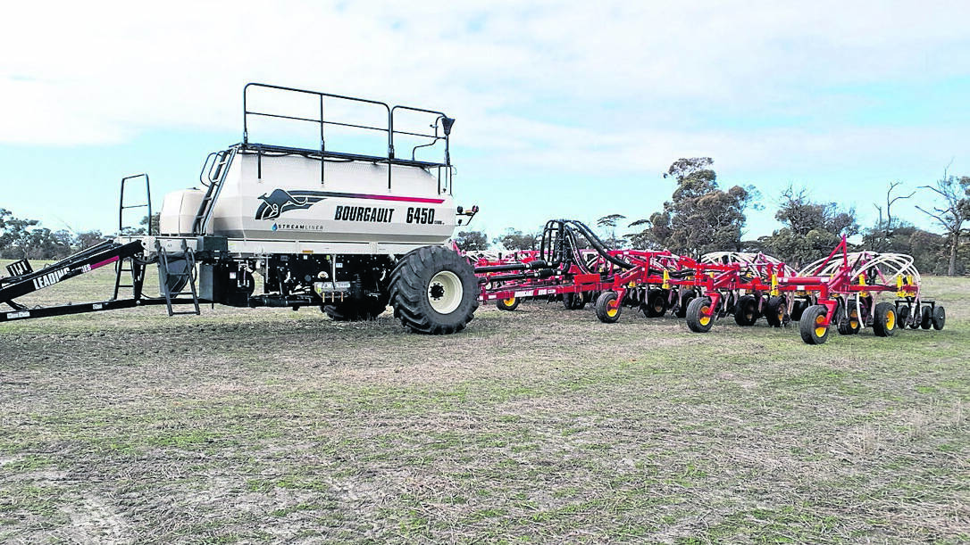This Bourgault seeding rig met with mixed success at last week's East Pingelly clearing sale. The 8910 bar sold for a sale top of $290,000 while the air seeder was passed-in.