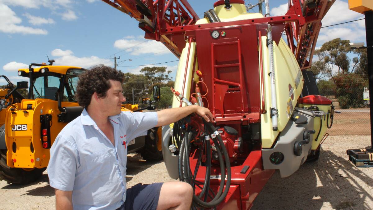 Boekeman Machinery Northam salesman Sam Moss says ISOBUS technology is keeping trailed boomsprayers in demand. See story. 