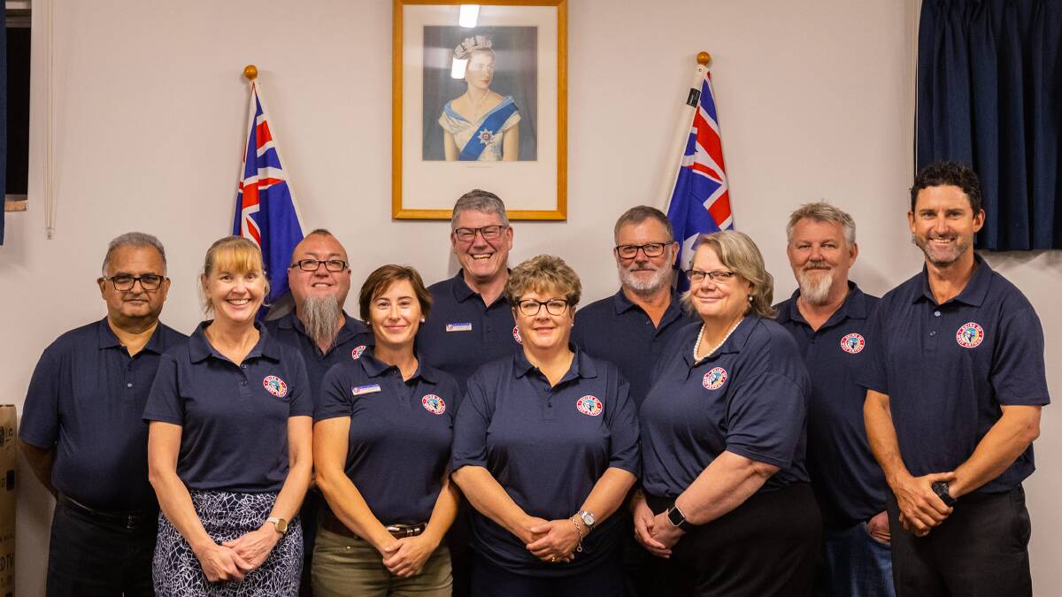 Shire of West Arthur council staff wearing their new TheMerinoPolo shirts gifted by WAMerinoCo owner and greasy wool buyer Steve Noa. Shire chief executive officer Vin Fordham Lamont is third from left in back row.