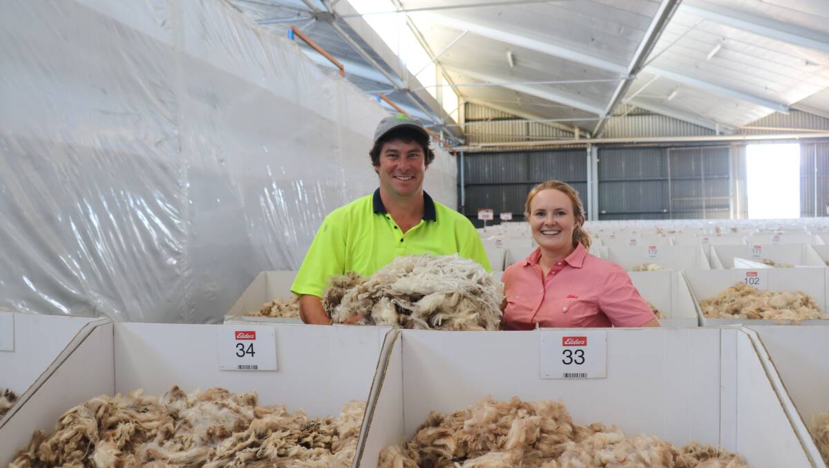  Glenn Smith (left), Wongamine farm, between Northam and Meckering, inspecting his show floor wool samples with Elders Northam, Moora, Carnamah and Mingenew district wool manager Breanna Hayes.