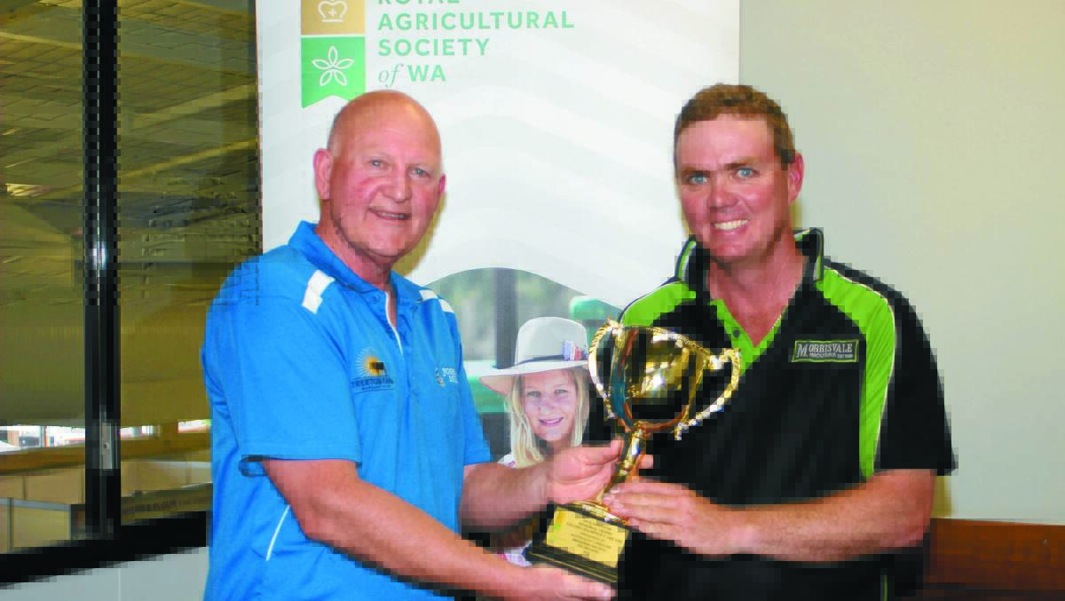 The Rob Millner trophy awarded for the highest number of points in the interbreed group of three purebred steers (hoof and hook), was awarded to the Limousin breed. Sponsor and Johnson Meats managing director Terry Russell (left), presented the trophy to James Morris, Morrisvale Limousin stud, Narrikup. The Morris family bred the three winning Limousin steers.