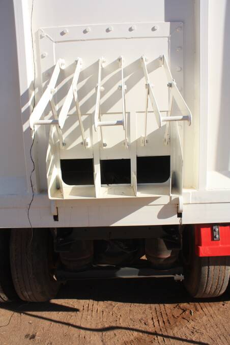 A close-up showing the three rear gates on the bin to discharge grain, urea and compound fertiliser. The gates can be operated manually or remotely.