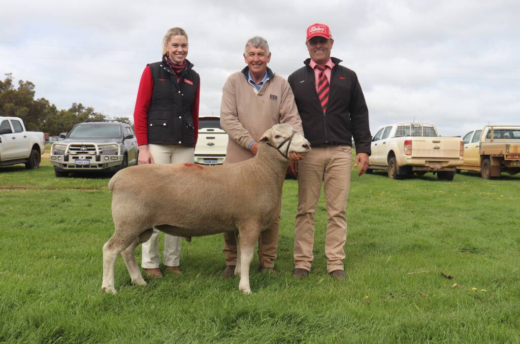 With the $3000 top price White Suffolk ram purchased by RE & A Shepherd, Mt Barker, were Elders livestock production specialist Tiarna Wallinger (left), Brimfield stud co-principal Max Whyte and Elders, Mt Barker representative Dean Wallinger.