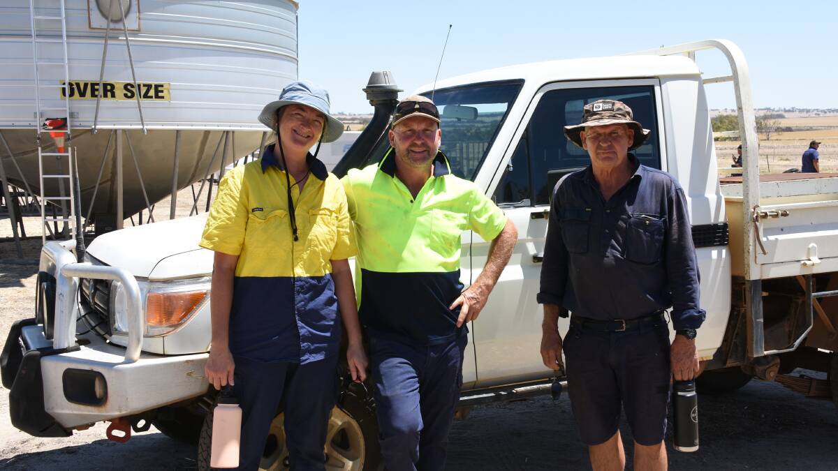 Jane Liu and Lincoln Mead, Whaddon Farms, Calingiri, caught up with neighbour Russell King, Calingiri, before the auction started. In the sale Mr Mead and Ms Liu purchased a 63t DE Engineers field bin for $26,000 and a 50ft Hobbs Engineering Agri Fab auger for $19,750.