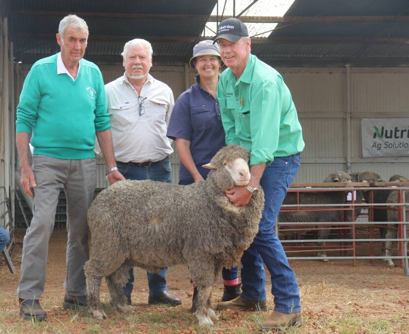Monte Verde stud principal Stanley Hall (left), top price buyer David Warburton, Frankland River, Fiona Hall and Nutrien Livestock auctioneer Charlie Staite with the $1900 Poll Merino ram.