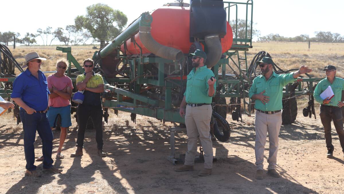 The top priced item in the clearing sale was the DBS 36ft air-seeder bar which sold to G & HR Glover, Wannamal, for $168,300 after fierce bidding from Harvest Road Group's Kim McDougall (left).